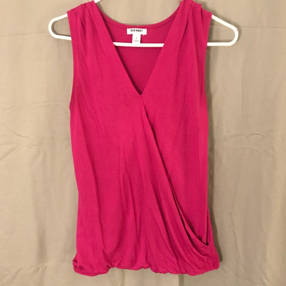 Sleeveless crossover front blouse